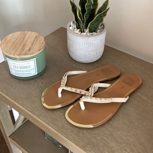 White sandals with gold detail